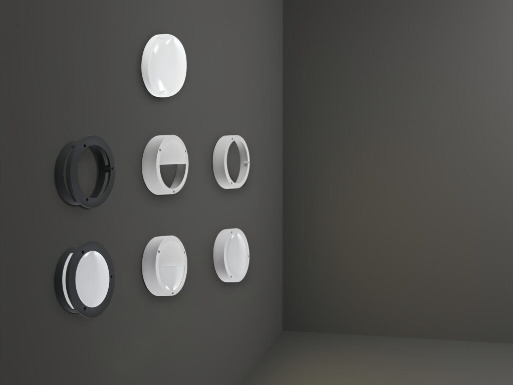 Round bulkhead LED light housings in black and white finishes — modern waterproof wall and ceiling light shells for indoor and outdoor lighting applications.