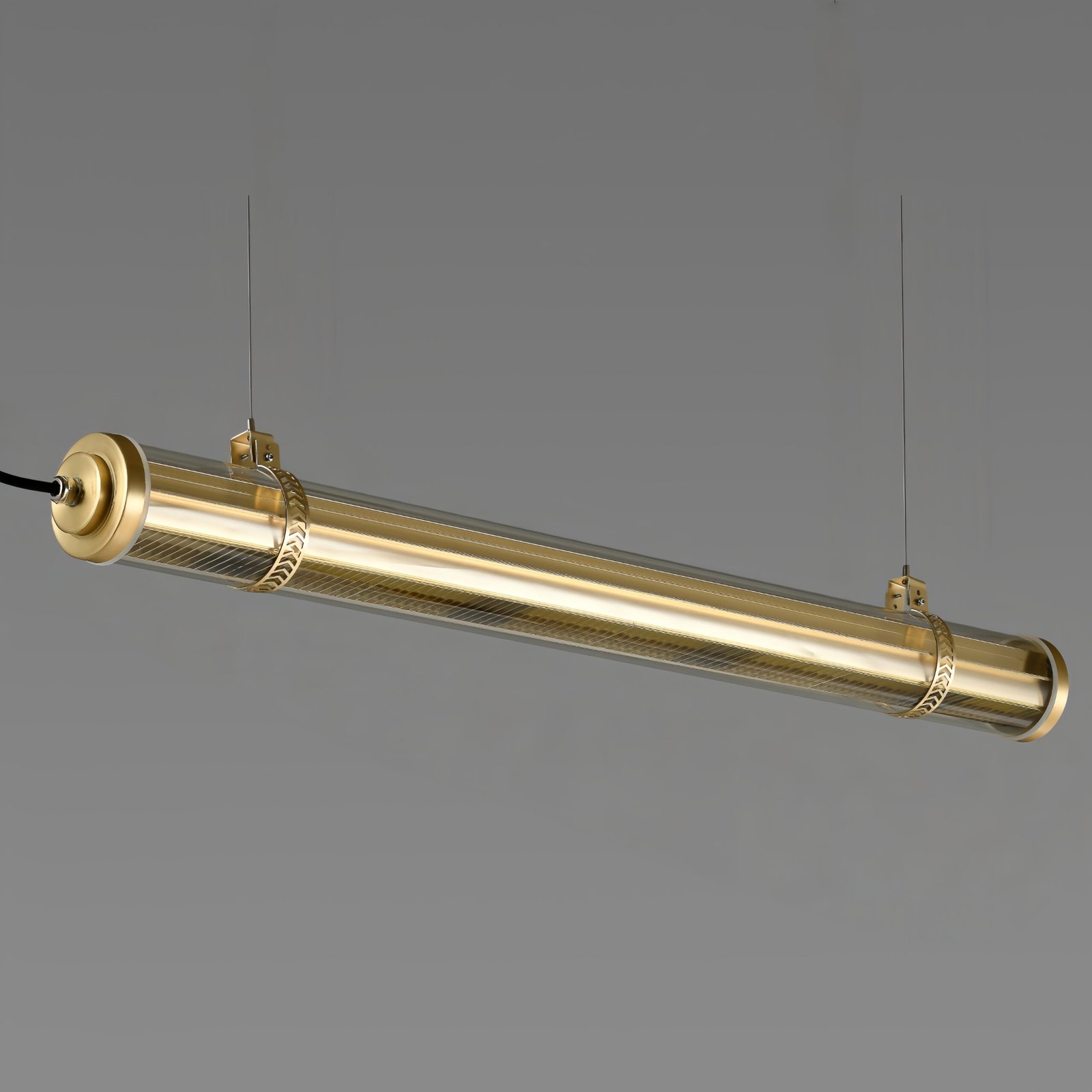 Aurelia Architectural Tubular Luminaire Aurelia up and down lighting tubular pendant with integrated grille, architectural brass LED suspension light