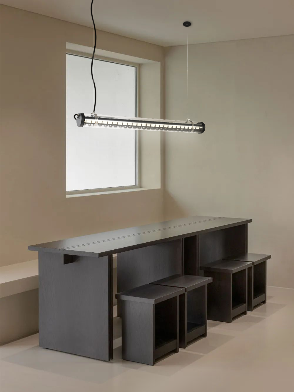 Rosa Architectural Tubular Luminaire Rosa wall-mounted architectural tubular lights installed at a residential entry porch — compact façade lighting for semi-outdoor use (MANI Lighting)