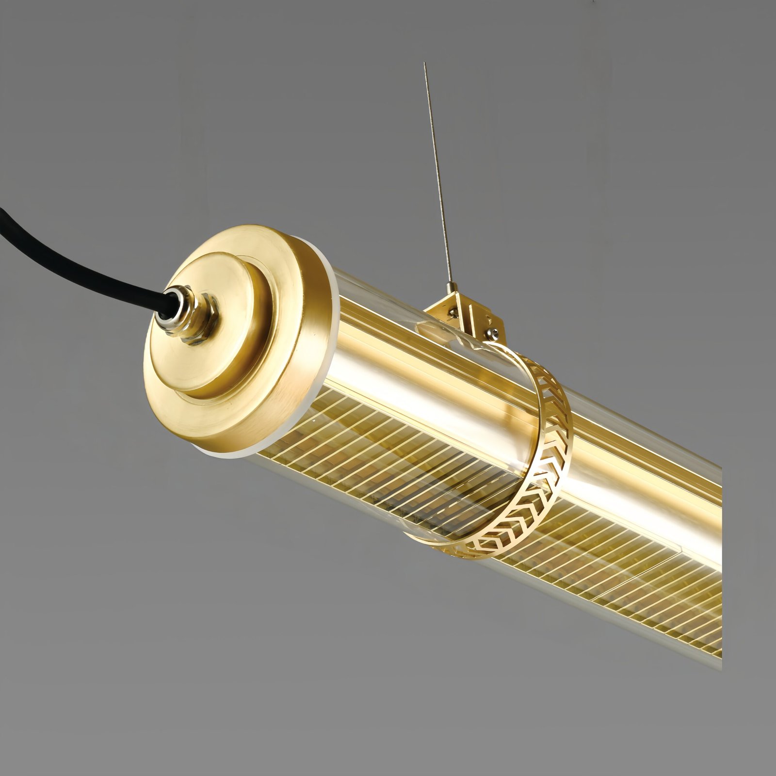 Aurelia Architectural Tubular Luminaire Aurelia up and down lighting tubular pendant with integrated grille, architectural brass LED suspension light
