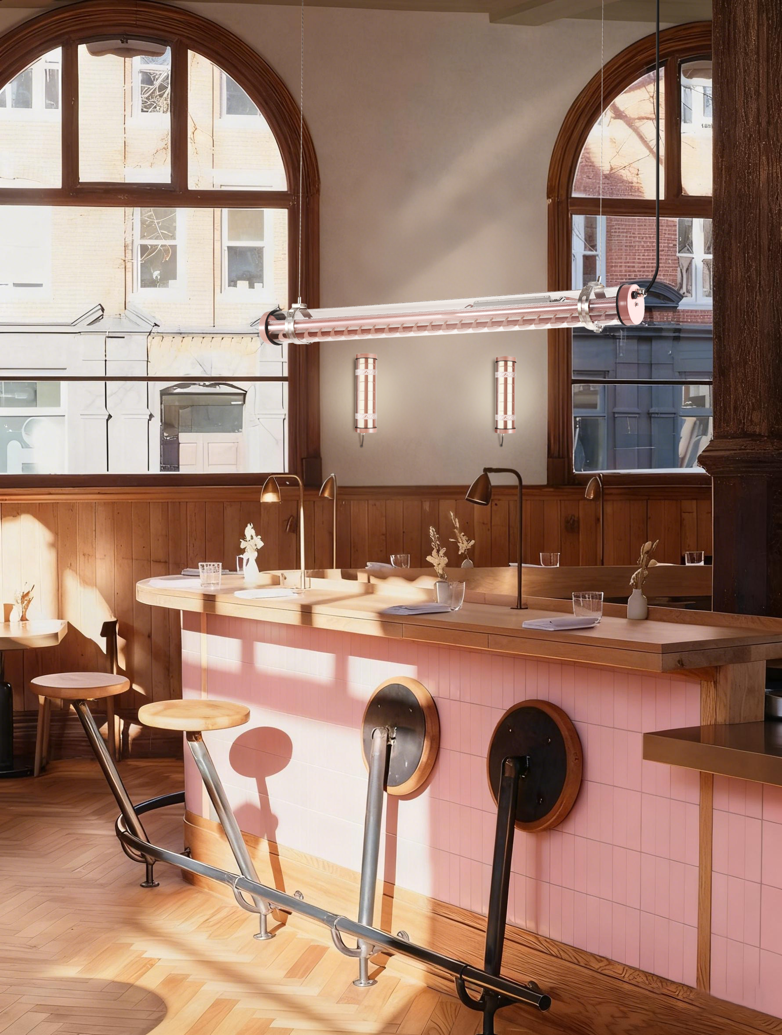 Rosa Architectural Tubular Luminaire Rosa wall-mounted architectural tubular lights installed at a residential entry porch — compact façade lighting for semi-outdoor use (MANI Lighting)