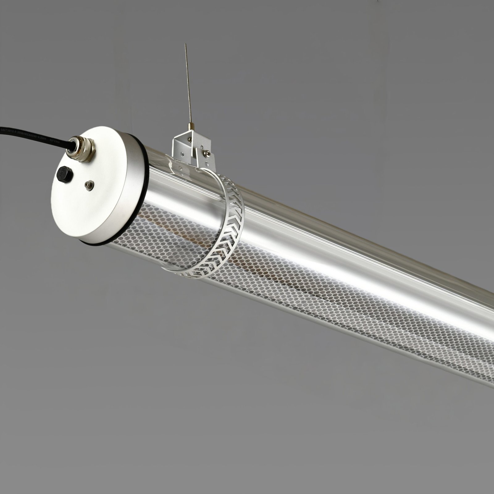 Hive Architectural Tubular Luminaire MANI Tubular luminaire with integrated honeycomb louver for glare control