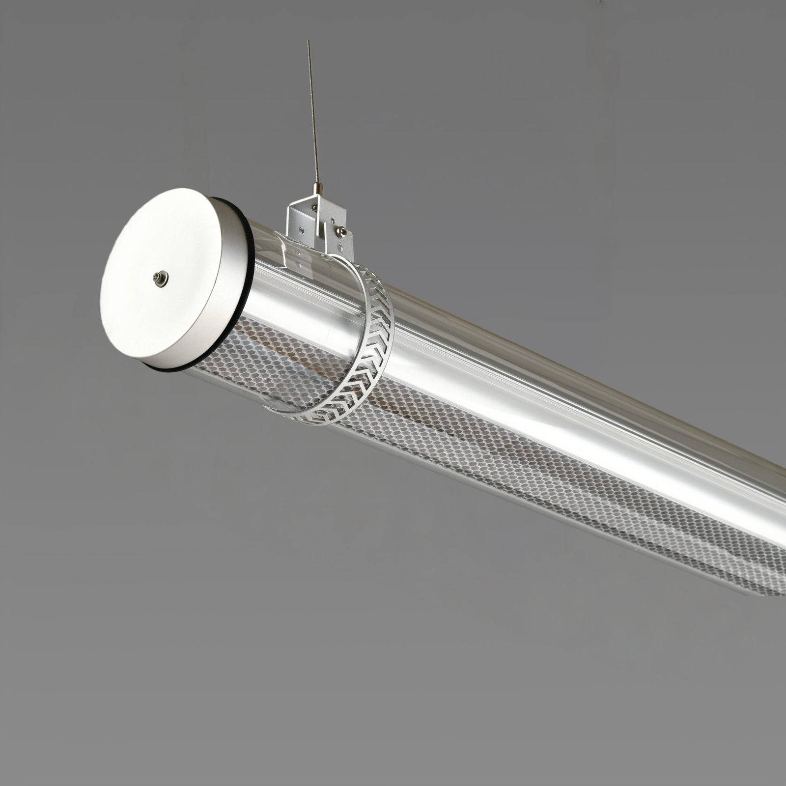 Hive Architectural Tubular Luminaire MANI Tubular luminaire with integrated honeycomb louver for glare control