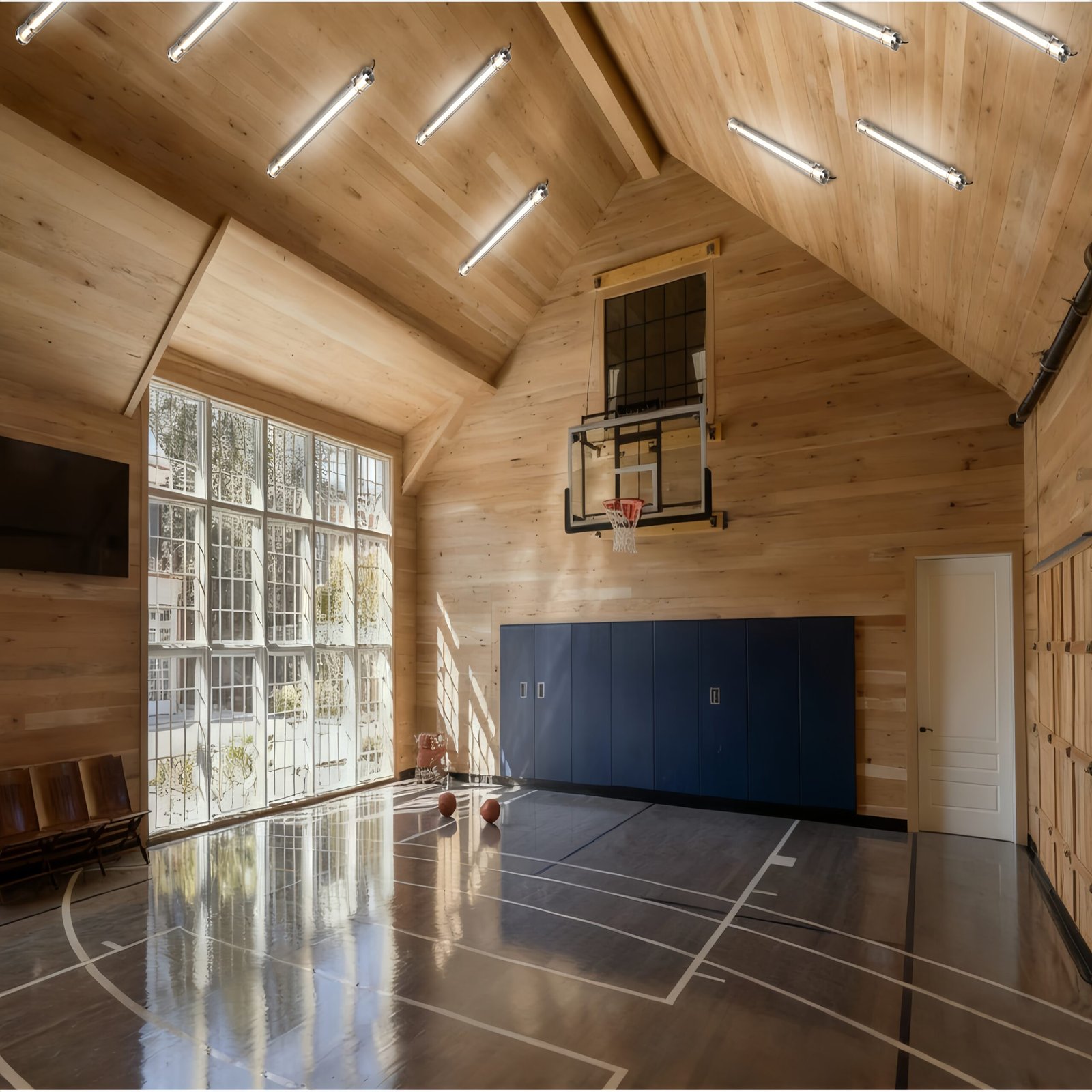 Wall-mounted and suspended installation tubular luminaires installed on a residential building façade, demonstrating clean, project-ready outdoor lighting application