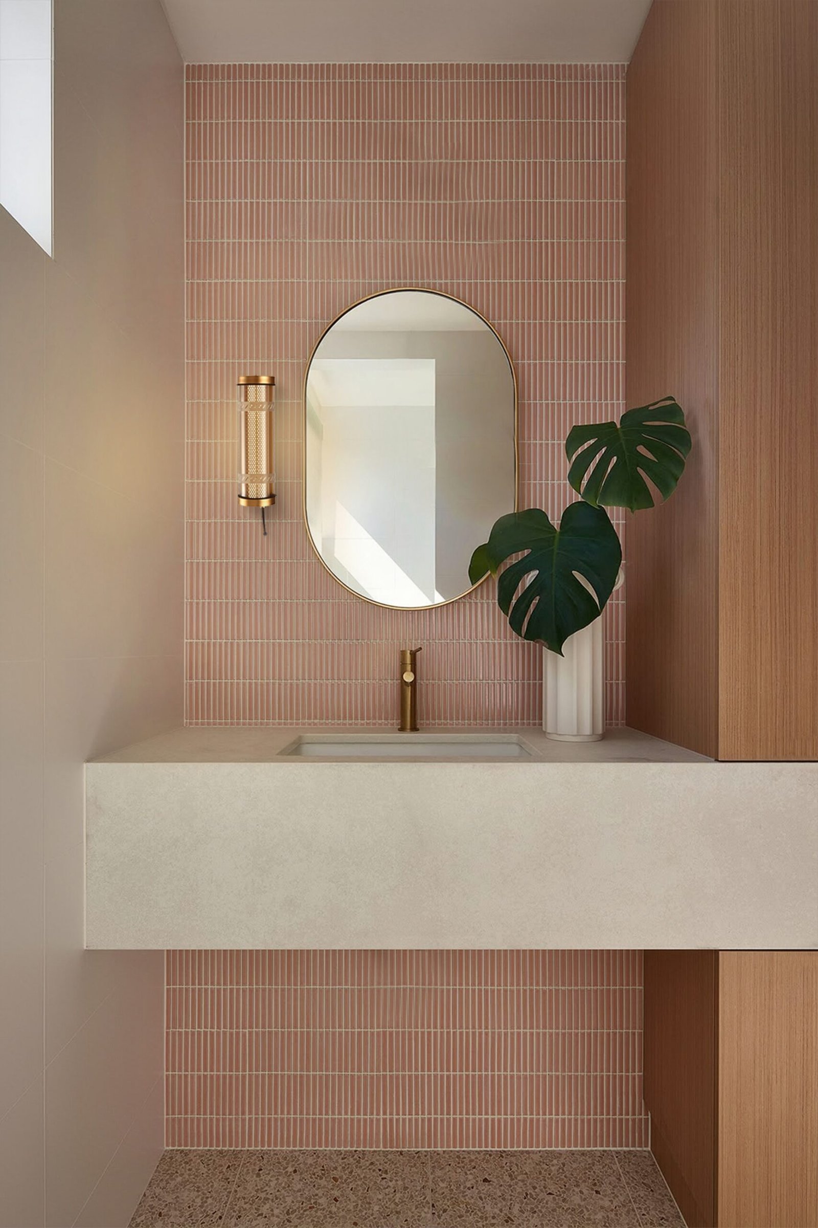 Arno Architectural Tubular Luminaire Arno IP67 IK10 architectural tubular wall lights installed on an outdoor building façade for long-term weather-resistant lighting