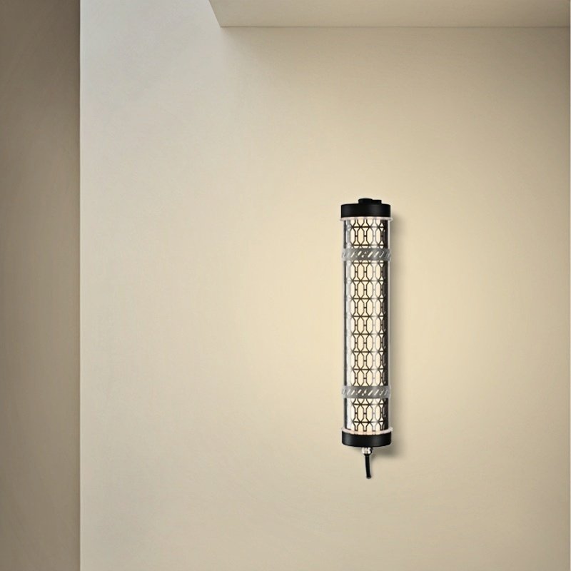 Architectural tubular wall light providing soft and uniform 360-degree illumination